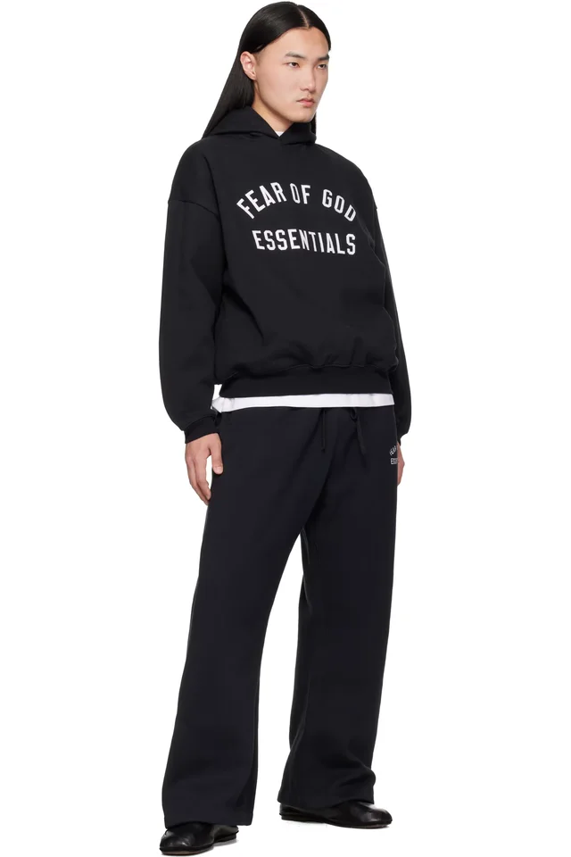Fear of God ESSENTIALS Black Varsity 90s Hoodie, photo 4 of 4 from SSENSE