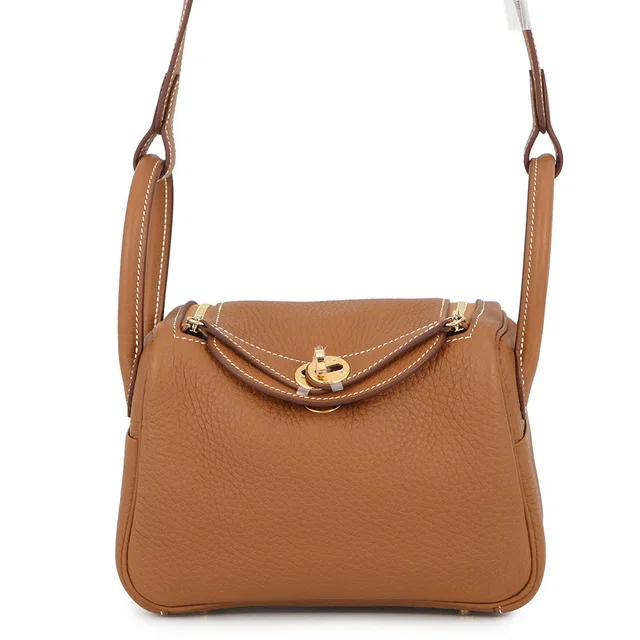 Hermès Lindy Gold Taurillon Clemence Size Mini in Gold Clemence leather from GALLERY RARE