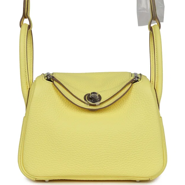 Hermès Mini Lindy Limoncello Clemence Palladium Hardware in Clemence leather from Madison Avenue Couture