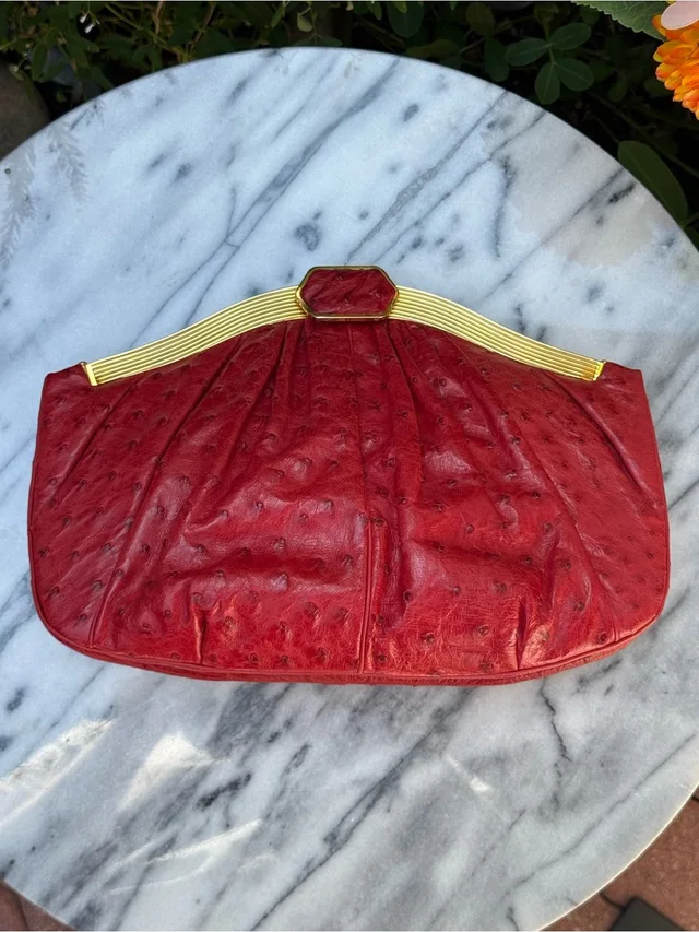 Vintage Neiman Marcus X Judith Leiber Red Ostrich Clutch W/ Gold Hardware in red Ostrich from Poshmark