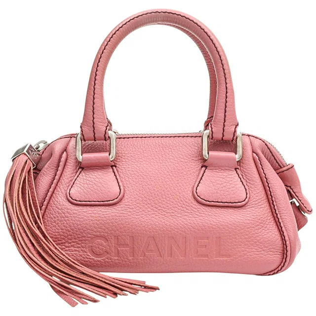 Chanel Circa 2008 Logo Embossed Tassel Mini Handbag, Pink in Pink Leather from VINTAGE QOO TOKYO