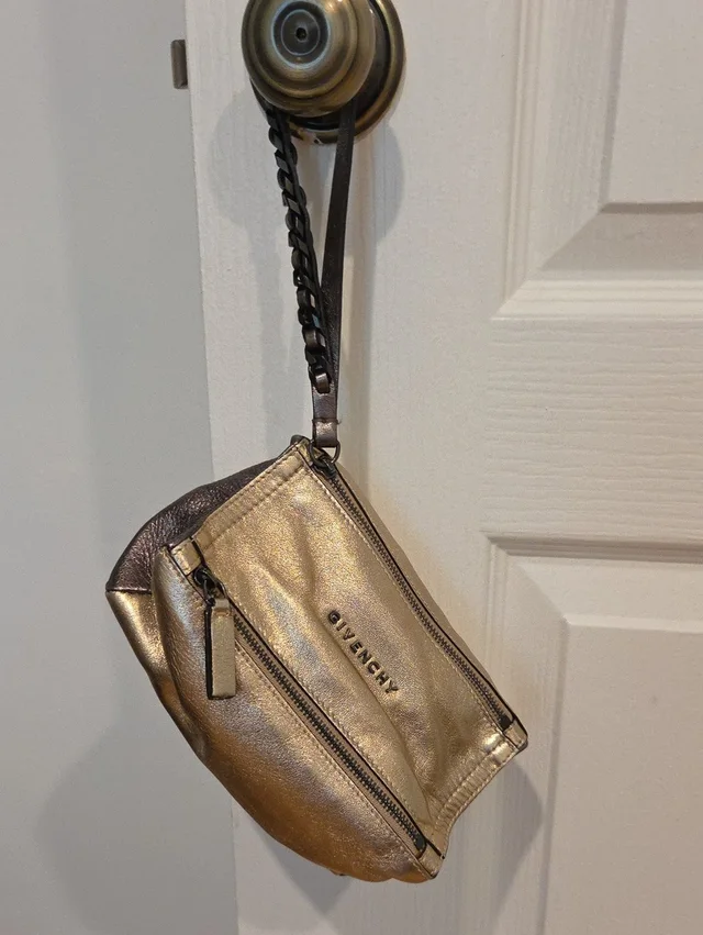 Givenchy Metallic Wristlet Clutch in gold|brown|red Leather from Poshmark, photo 1 of 1