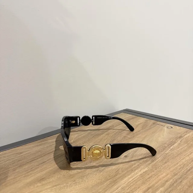 Versace Women's Sunglasses - Black in black from Depop, photo 1 of 1