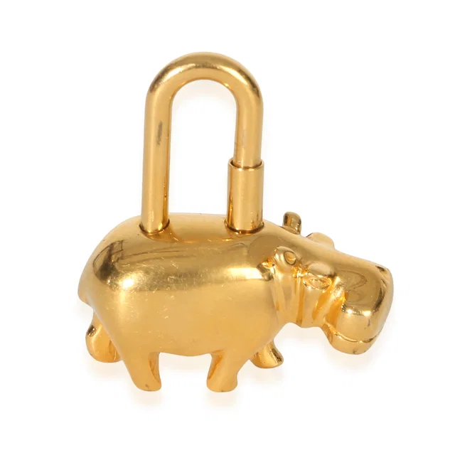 Hermès Cadena Hippopotamus 2005 Annee Des Fleuves Gold Lock Charm Leather; Other Bag Charms in Gold Leather from HEWI