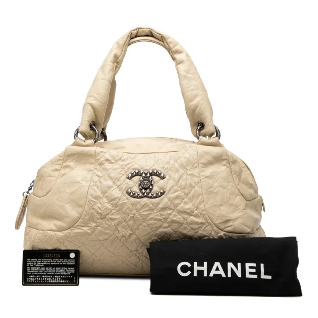 Beige Chanel CC Quilted Aged Calfskin Coco Rider Bowling Bag in Beige Calfskin from Designer Revival, photo 11 of 11
