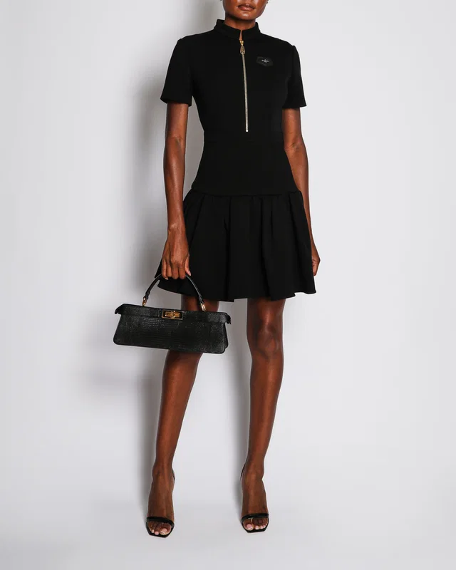 Louis Vuitton Black Short Sleeve Peplum Dress with Patch Leather Logo Size FR 36 (UK 8) in Black Leather from Sellier