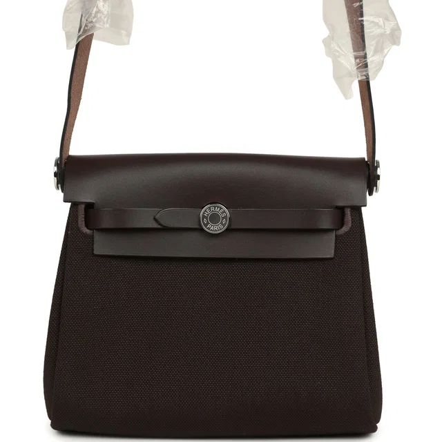 Hermès Herbag Zip 20 Mini Ebene Toile Militaire Canvas and Vache Hunter Palladium Hardware in Brown Canvas from Madison Avenue Couture