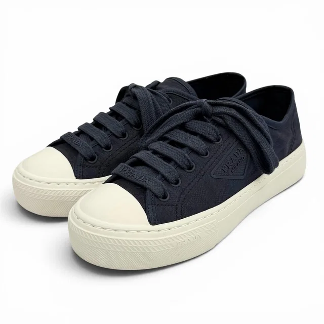 Prada Triangle Logo Pattern Fabric Sneakers Navy in Navy from The Reluxe