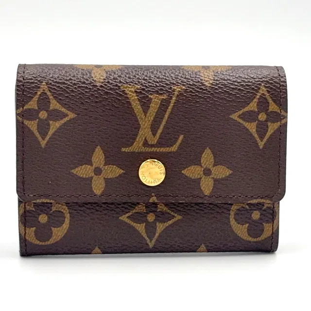 Louis Vuitton Porte Monnaie Pura Monogram Leather Brown Coin Purse Gold in Brown Leather from The Reluxe