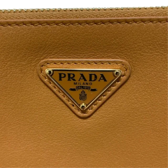 Prada Triangle Plate Soft Grain Leather Shoulder Bag in Brown Leather from LuxUness, photo 7 of 16