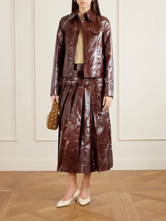 TOLU COKER Pleated glossed-leather midi skirt in Brown, photo 2 of 2 from NET-A-PORTER (Canada)