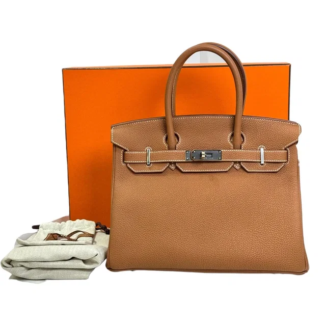 Hermès Birkin 30 Gold/Silver Togo in Gold Togo leather from Luxury Promise