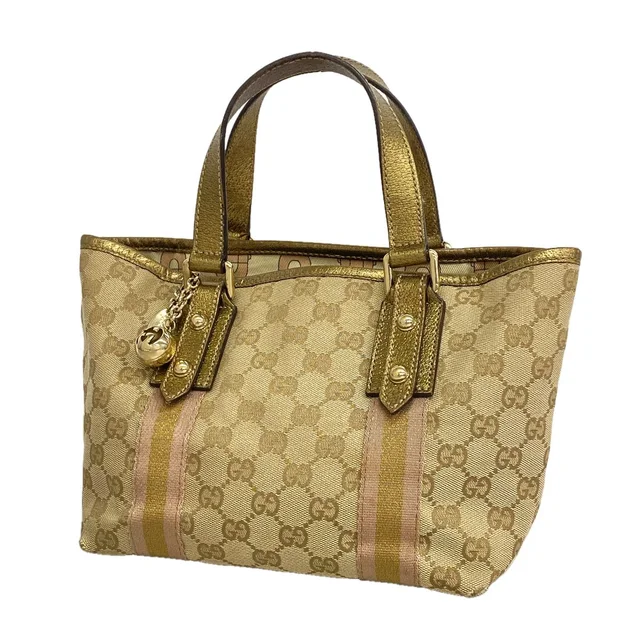 Gucci Handbag GG Canvas Beige Brown Champagne Gold in Brown Canvas from The Reluxe