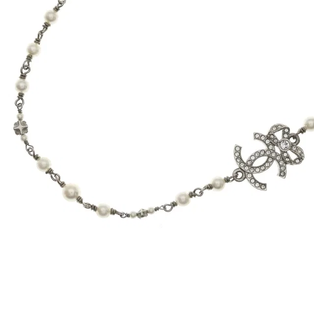Chanel CC Logo Necklace Choker Pearl Rhinestone Ribbon Silver in Silver from The Reluxe