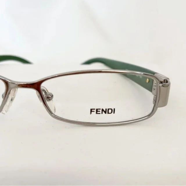 Fendi Women's Sunglasses - Green/Silver in silver|gray|green from Depop, photo 7 of 8