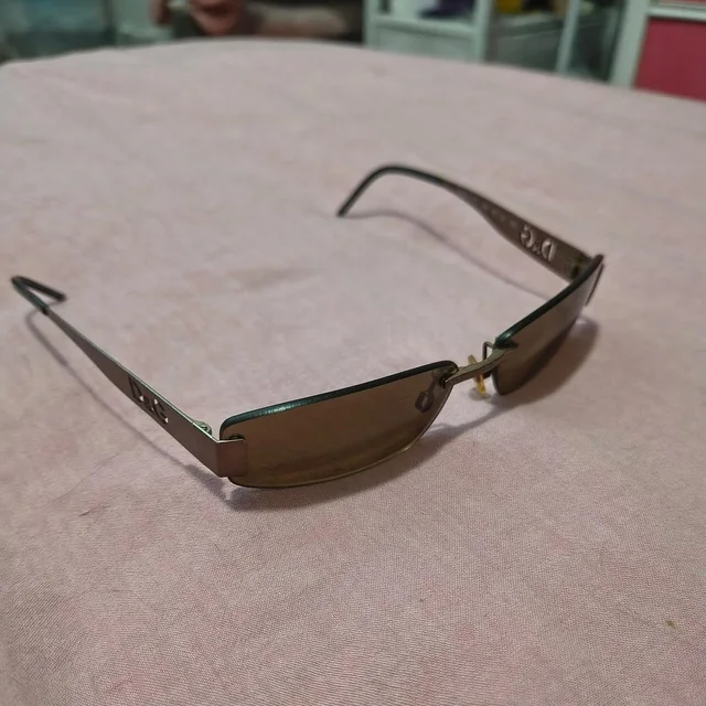 Dolce & Gabbana Men's Sunglasses - Silver/Gold in silver|gold|gray from Depop, photo 1 of 1