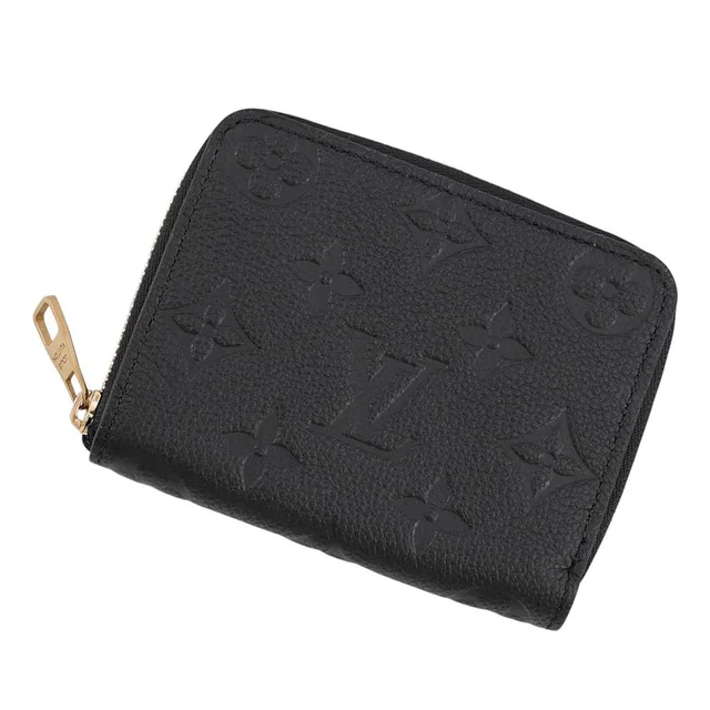 Louis Vuitton Coin Purse Monogram Empreinte Zippy Wallet Black in Black from The Reluxe