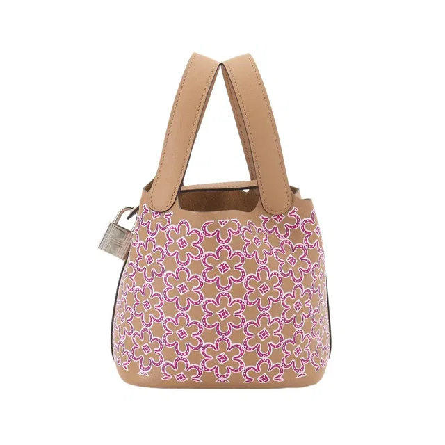 Hermès Picotin Lock Micro Lucky Daisy Hand Bag Swift Chai Rose Blanc in White Swift leather from Luxury Promise