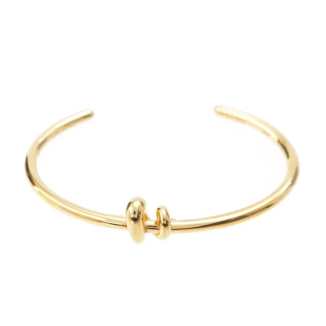 Fendi Filo Brass Twist Bangle Gold Bracelet in Gold from The Reluxe