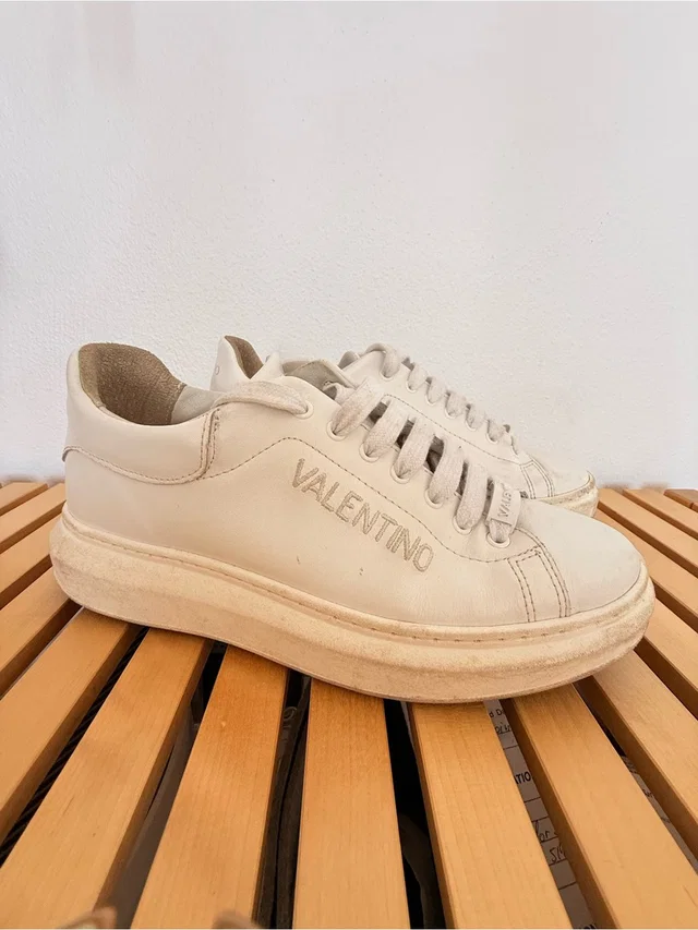 Valentino Garavani Cream Leather Low-Top Sneakers in white Leather from Poshmark