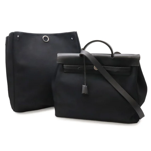 Hermès Herbag MM 2-Way Shoulder Bag Toile Officier Canvas Black Stopper Out in Black Canvas from The Reluxe