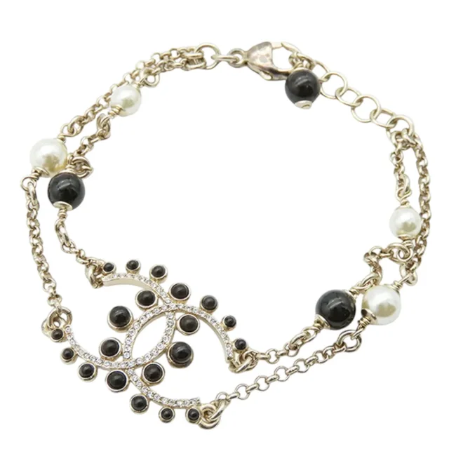 Gold Chanel Gold Plated CC Faux Pearl Rhinestones Bracelet in Gold from Designer Revival