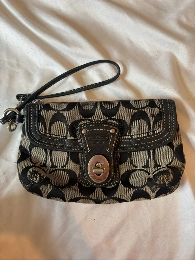 2005 Coach Black And Khaki Signature Turnlock Wristlet in black|brown|neutral Leather from Poshmark