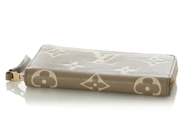 Louis Vuitton Dove and Cream Bicolor Monogram Empreinte Leather Zippy Wallet in White Leather from Ann's Fabulous Finds, photo 6 of 9