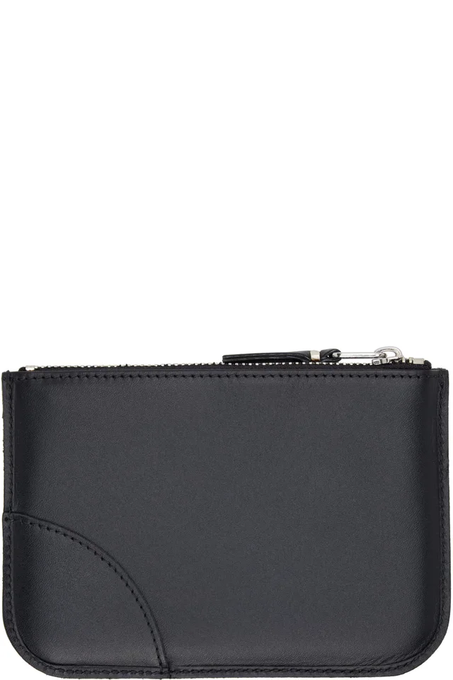 COMME des GARÇONS WALLETS Black Eyelet Pouch, photo 2 of 2 from SSENSE