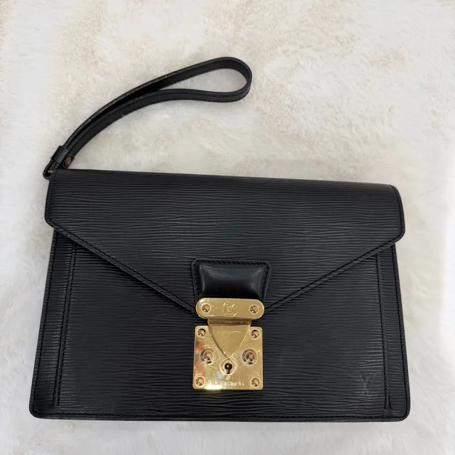 Louis Vuitton Black Epi Dragonne Clutch in Black Leather from SparklesnDreams