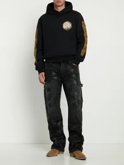 Amiri Baggy jeans with embossed details in 100% Cotton, 100% Calf, photo 2 of 5 from LUISAVIAROMA