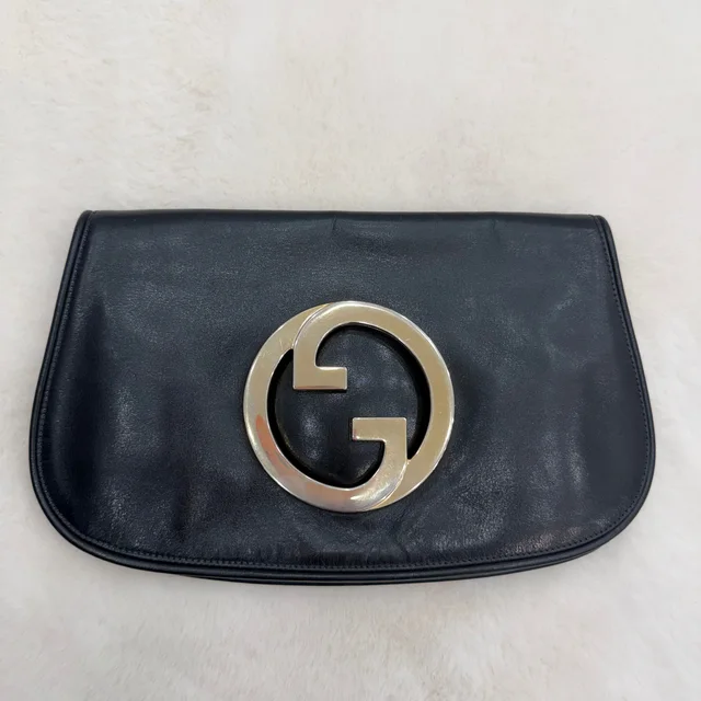 Gucci black/silver interlocking GG Clutch in Black Leather from SparklesnDreams