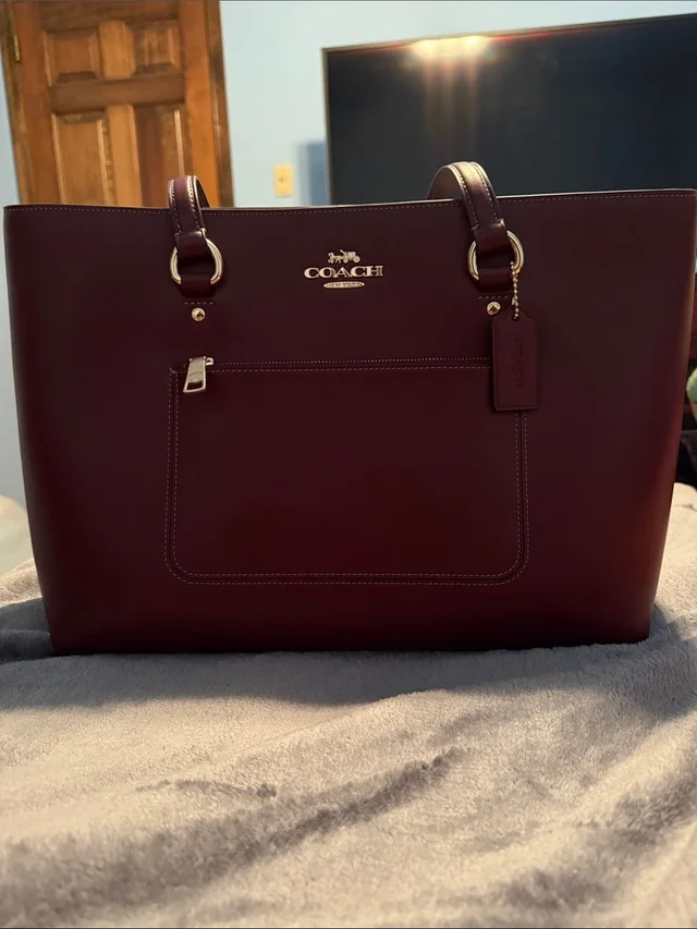 Coach Maroon Station Tote in red from Poshmark