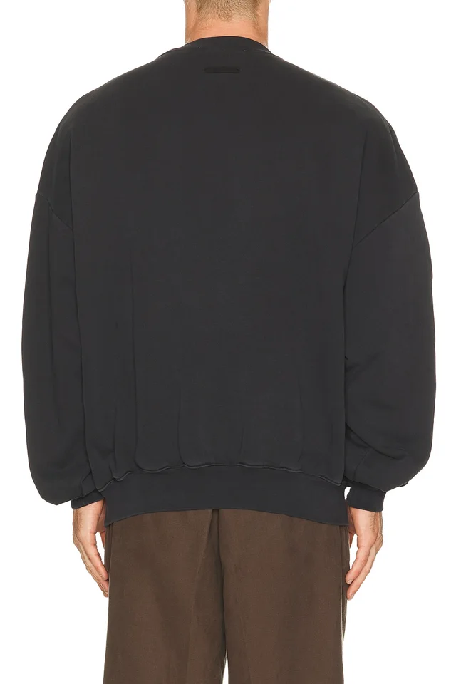 Fear of God ESSENTIALS Training 90's Crewneck Sweatshirt in Faded Black, photo 2 of 4 from REVOLVE (Canada)