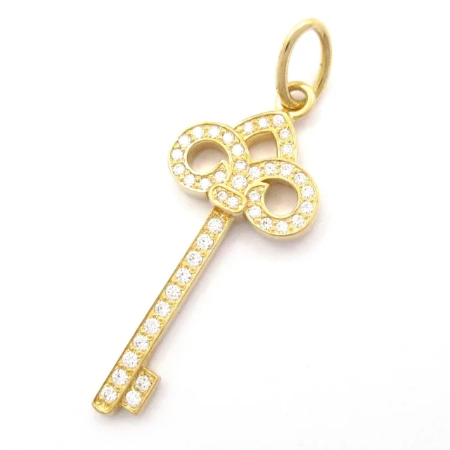 Tiffany & Co. Pendant Fleur de Lis Key Mini 18k Yellow Gold Diamond in Yellow from The Reluxe