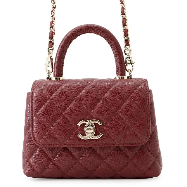 Chanel Handbag Quilted Coco Handle Mini Caviar Leather 2-Way Chain in Caviar leather from The Reluxe