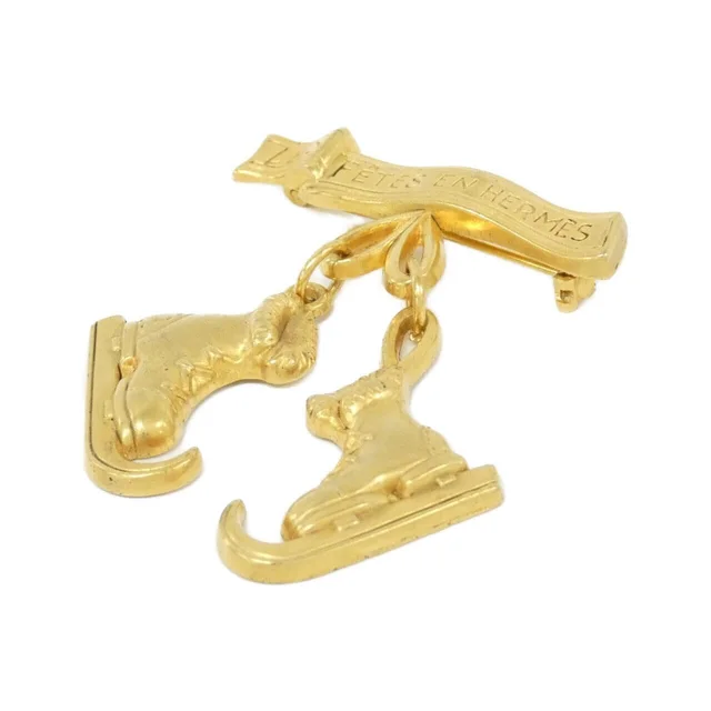 HERMES brooch in MAT GOLD 横x縦: 4cmx5cm from KOMEHYO