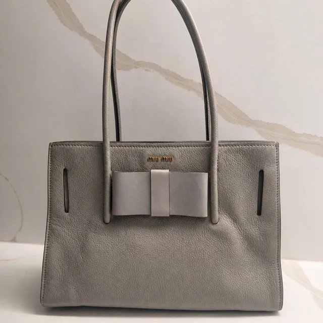 Miu Miu Women's Tote bags - Grey/Cream in gray from Depop, photo 1 of 1