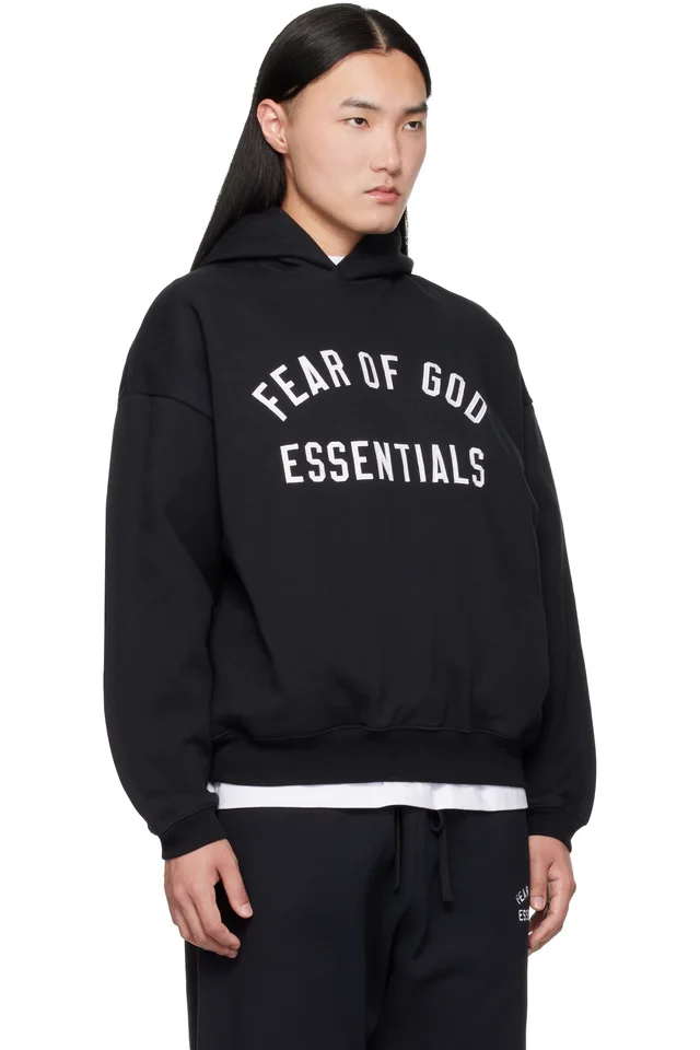 Fear of God ESSENTIALS Black Varsity 90s Hoodie, photo 2 of 4 from SSENSE