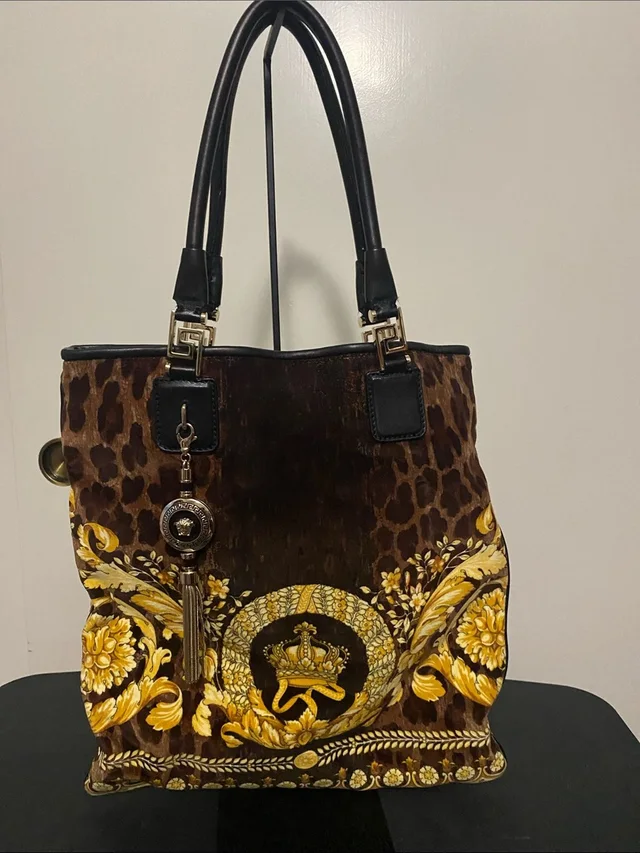 Versace Leopard Print Velvet Bucket Bag in gold|brown|red Velvet from Poshmark