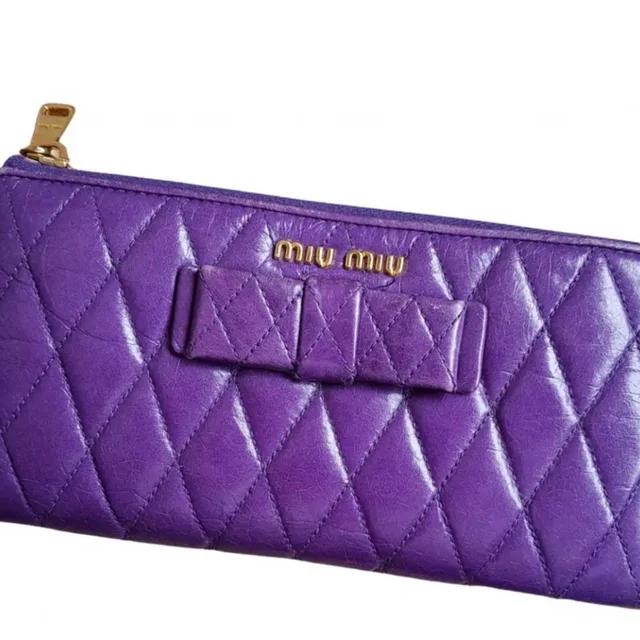 Miu Miu Violet Quilted Clutch in purple from Poshmark, photo 1 of 1