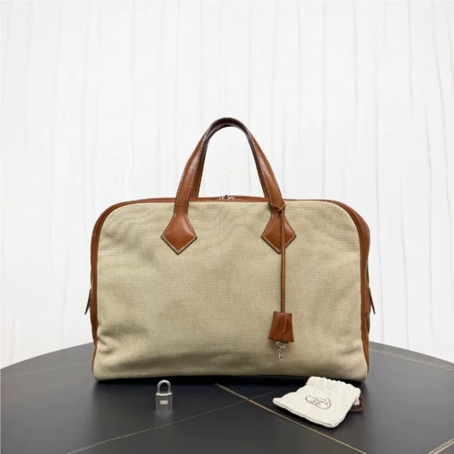 Hermès and white color-blocked Victorian canvas tote bag, size 40 in Brown Canvas from Luxury Promise
