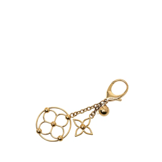 Gold Louis Vuitton Gold Plated Bloomy Bag Key Chain in Gold from Designer Revival