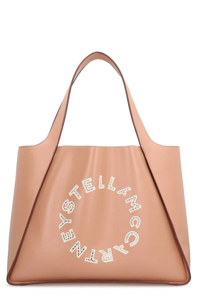 Stella McCartney Perforated Logo Tote Bag — Pink Polyurethane in Pink from HEWI