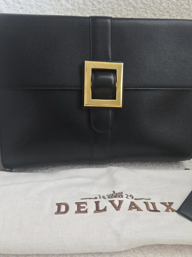 Delvaux Black Leather Clutch With Gold Accent Excellent Condition in black|gold Leather from Poshmark