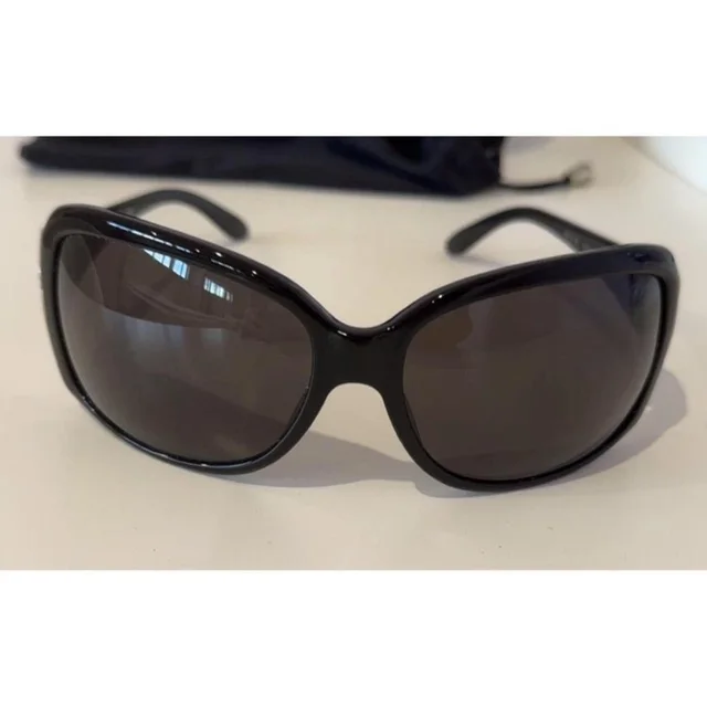 Bvlgari Women's Sunglasses - Black/Brown in red|brown|black from Depop, photo 1 of 1