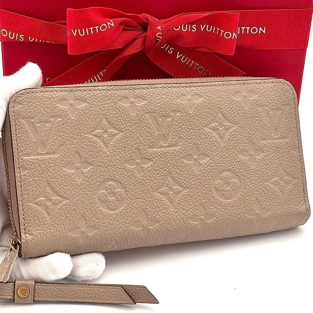 Louis Vuitton Wallet Zippy Tourterelle Beige in Beige from The Reluxe