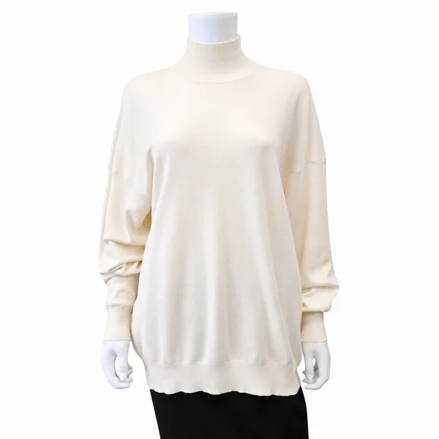 The Row Ivory Silk & Cotton Oversized Turtleneck Sweater from Clotheshorse Anonymous