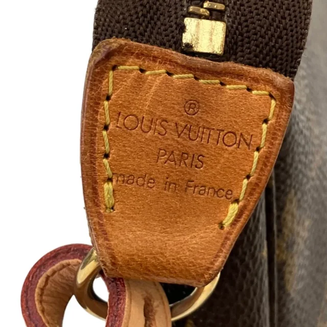 Louis Vuitton Monogram Accessoire Pouch in Brown Canvas from LuxUness, photo 7 of 12