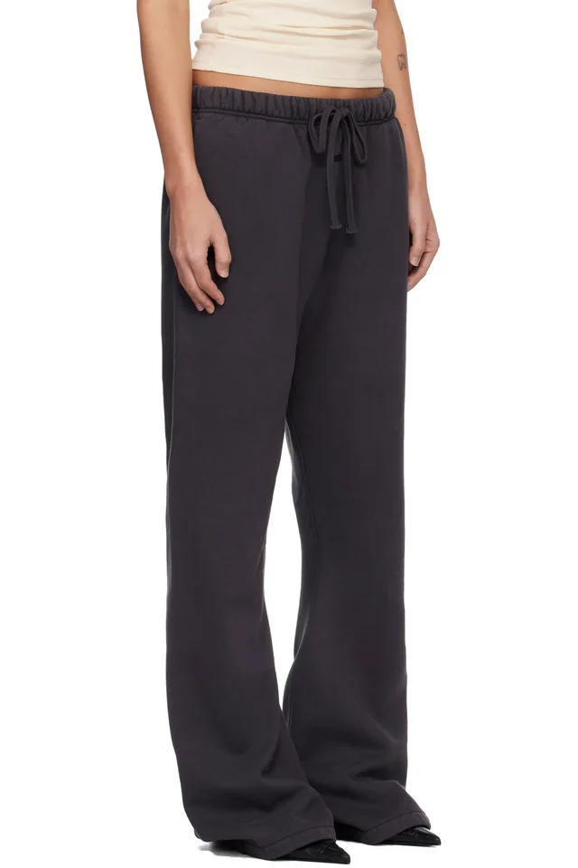 Fear of God ESSENTIALS Black Signature Classic Fit Flare Sweatpants, photo 2 of 4 from SSENSE